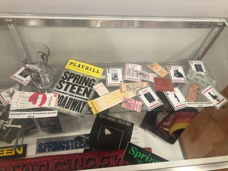 Display case of Springsteen on Broadway tickets, a Playbill and other memorabilia