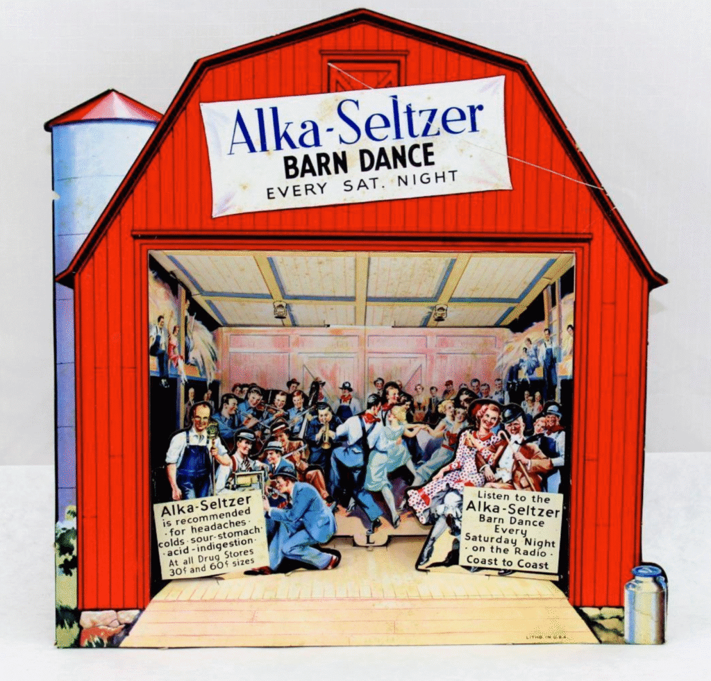 A lively vintage scene of people dancing inside a red barn, advertising the "Alka-Seltzer Barn Dance" on a Saturday night. Joyful, energetic atmosphere.