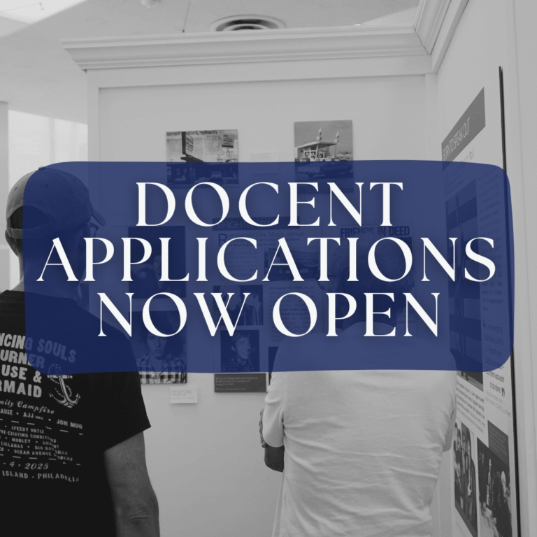 Docent Applications Now Open - two visitors viewing museum exhibits