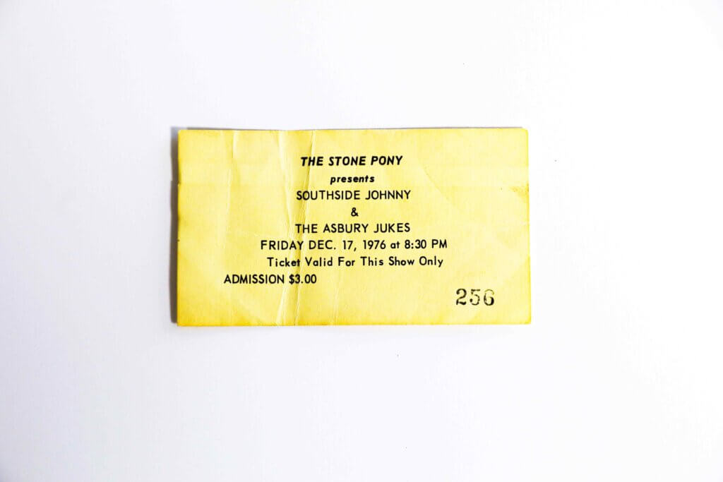 Yellow concert ticket for Southside Johnny & The Asbury Jukes at The Stone Pony, dated December 17, 1976. Admission is $3.00. Ticket number 256.