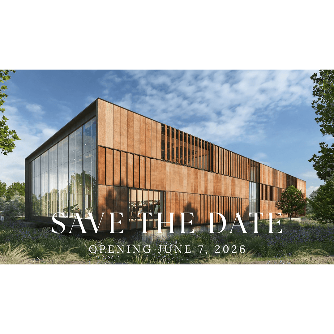 Modern building with wooden panels and large glass windows under a clear blue sky, surrounded by greenery. Text reads "Save the Date, Opening June 7, 2026."