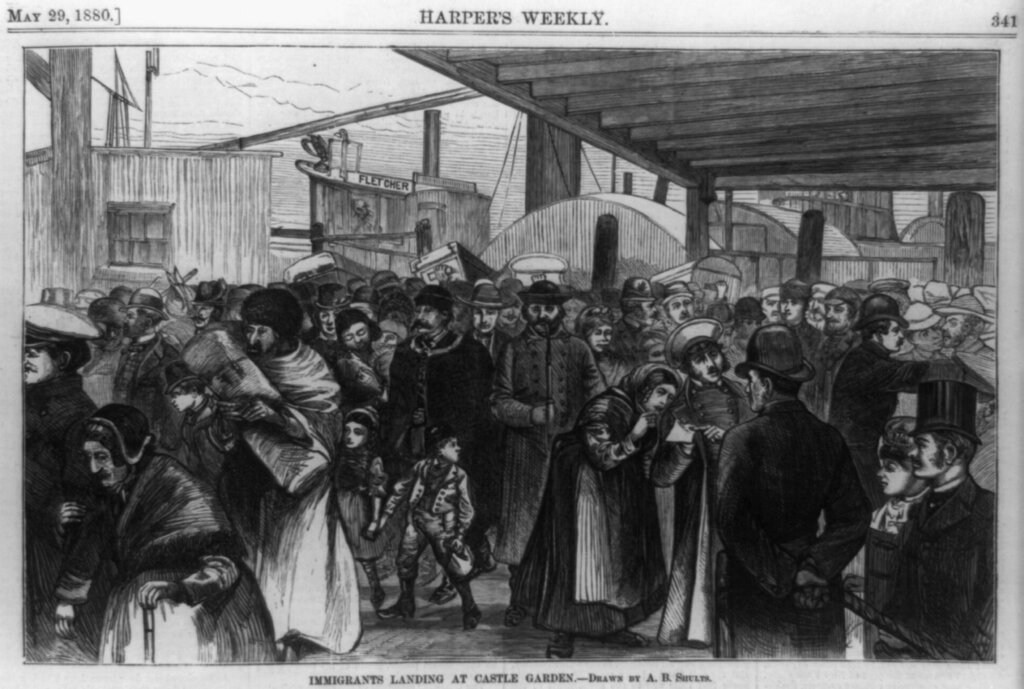 A bustling 1880s scene of immigrants arriving at Castle Garden, New York. A diverse crowd of people in period attire, some with luggage, conveys a hopeful yet tense atmosphere.