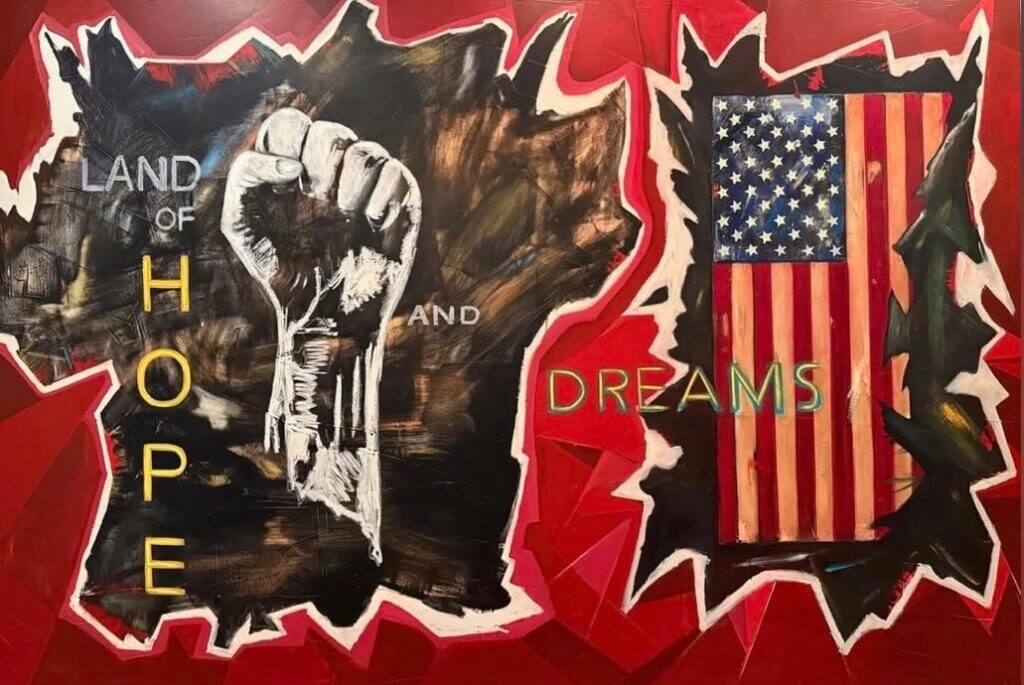 A powerful artwork featuring a raised fist labeled "Land of Hope" on the left and an American flag labeled "Dreams" on the right. The red, black, and white color scheme conveys strength and unity.