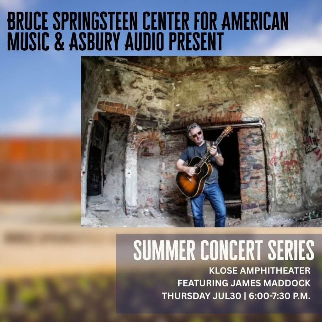 Promotional graphic for the Bruce Springsteen Center for American Music and Asbury Audio's Summer Concert Series. The graphic features a photo of musician James Maddock playing an acoustic guitar inside a weathered brick building. Text reads: "Bruce Springsteen Center for American Music & Asbury Audio Present," "Summer Concert Series," "Klose Amphitheater," "Featuring James Maddock," and "Thursday, Jul. 30 | 6:00–7:30 p.m." The background is a softly blurred outdoor landscape.