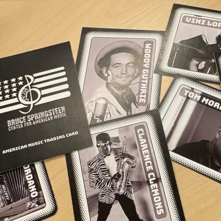 American Music Trading Cards featuring Woody Guthrie, Clarence Clemons, Vini Lopez and Tom Morello, with the Center logo card
